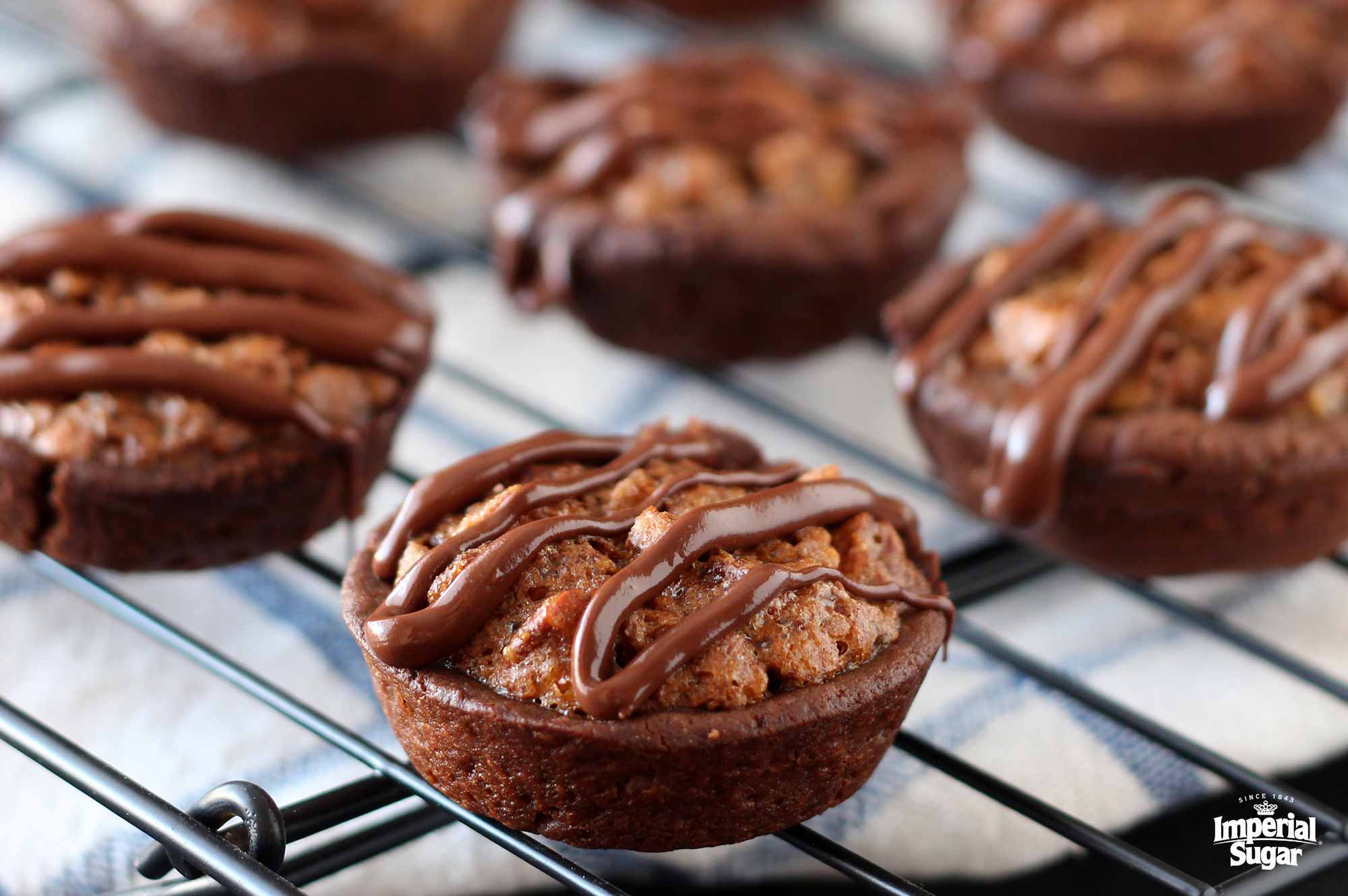 https://www.dixiecrystals.com/sites/default/files/recipe/Chocolate-Pecan-Tassies-imperialsugar.jpg